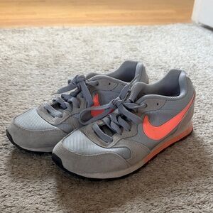 Nike Women’s Gray Sneakers with Coral Swoosh Accent